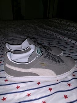 Grey suede pumas