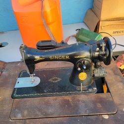 1949 Singer sewing machine with cabinet.  With Cabinet  And Accessories