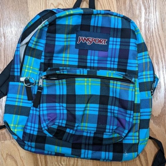 blue and yellow jansport backpack Big Student and zippered utility pockets keep all of your gear organized Buy Jansport Blue Floral Cross