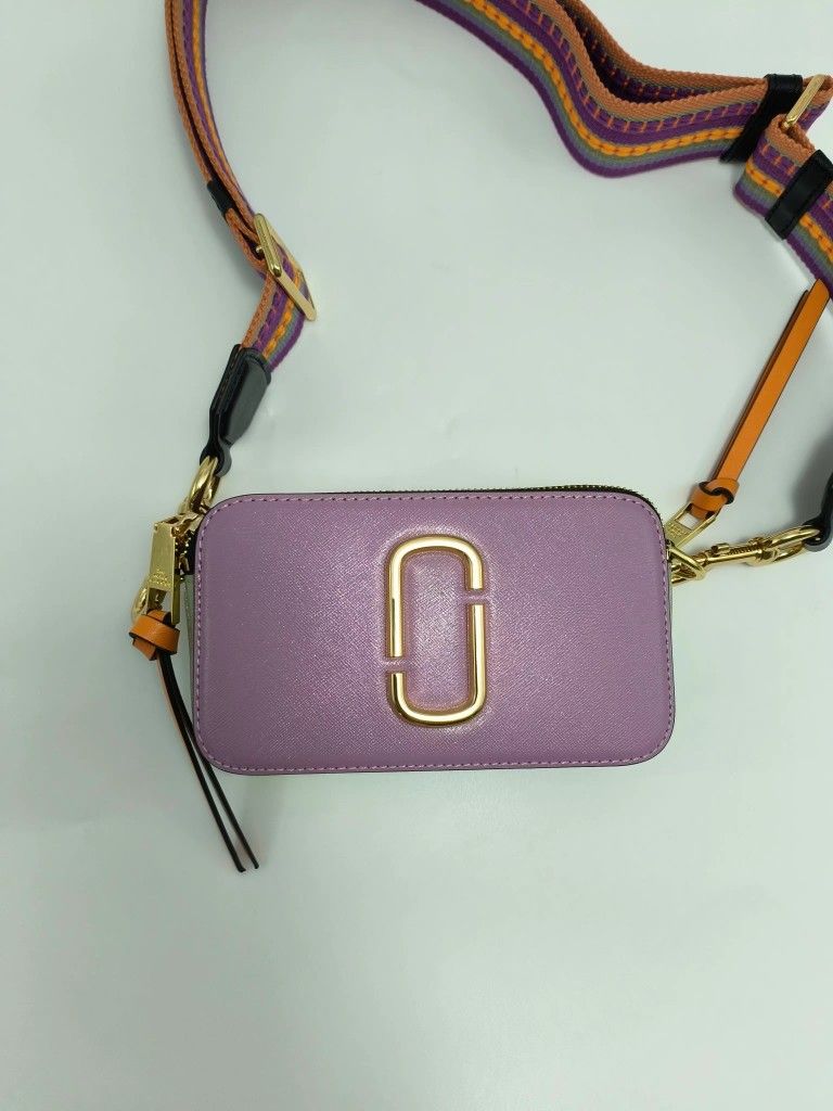 Brand new purple crossbody bag.