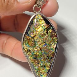 Ammolite gemstone pendant in Sterling Silver.