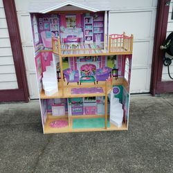 Kid Kraft Doll House (5.5 feet tall)