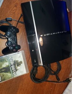 Sony PlayStation 3 Console with Controller and Game