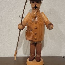 Insence burner smoking fisherman