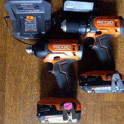Ridgid 18 Volt Drill And Impact Kit With Batteries Charger And Carry Bag