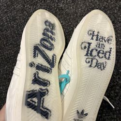 Adidas Superstar sneakers from the Arizona Iced Tea collaboration, specifically the "Have an Iced Day" edition i