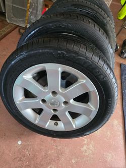 Nissan Sentra OEM 16 inch Rims and Tires Lug pattern 4x114.3mm