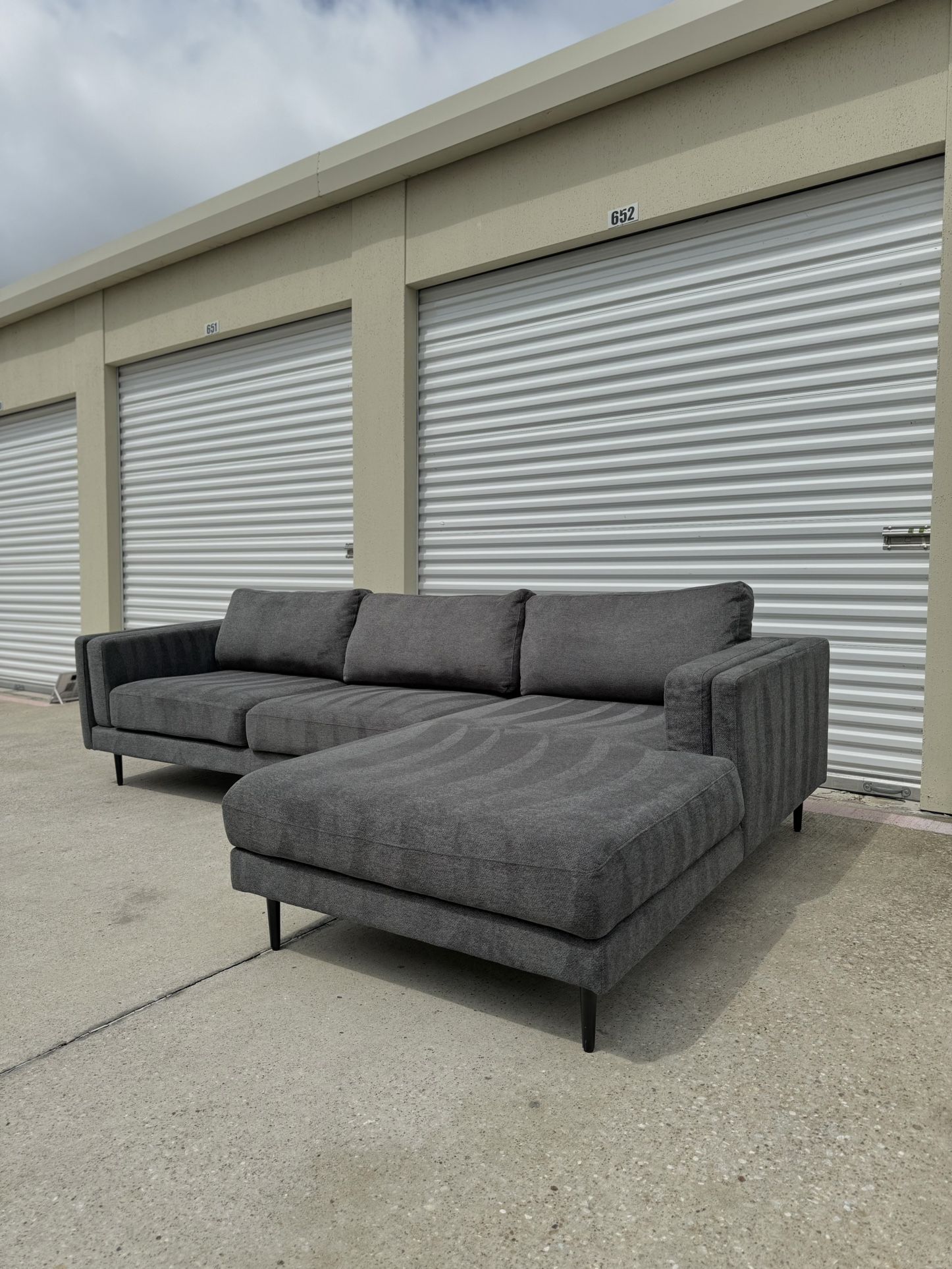 New Beautiful Grey Living Spaces Sectional Sofa, Can Deliver!