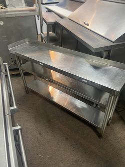Table With Shelves Perfect For Restaurant 