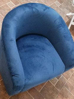 In like new condition blue chair free delivery with purchase