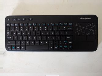 Logitech K400r  wireless keyboard with touchpad. Also great for TV's and such