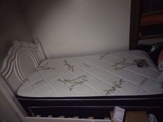 Twin bed with headboard