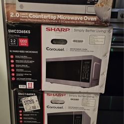 STAINLESS STEEL MICROWAVE OVER THE COUNTER.....NEW....$ 100 EACH