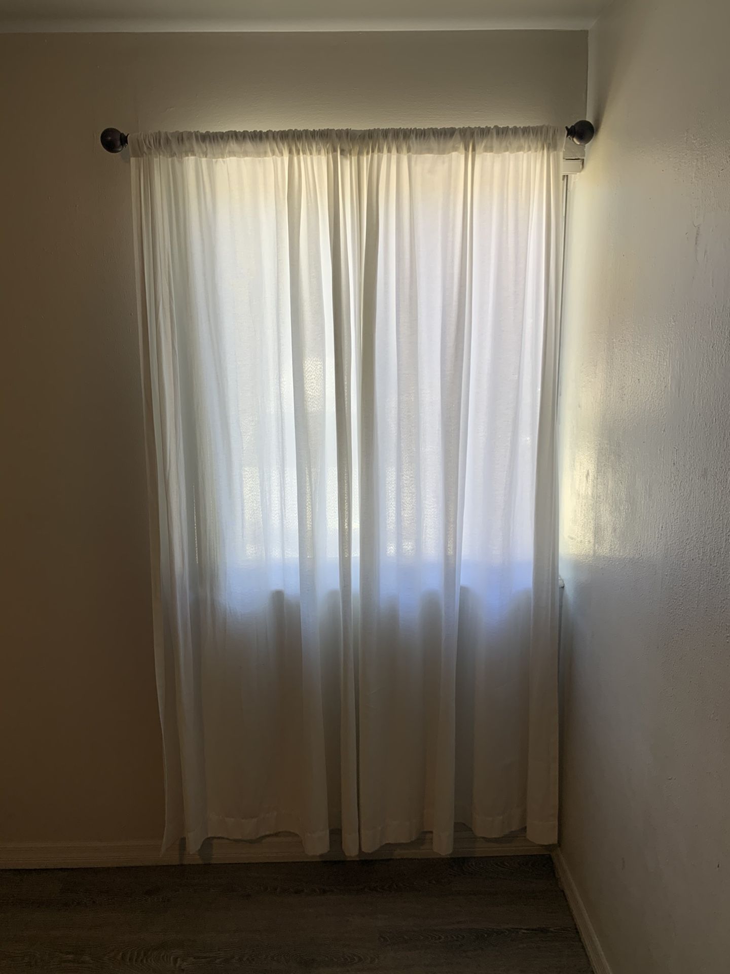 White curtain panels and bronze rod!