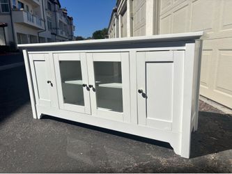 White farmhouse-style tv stand