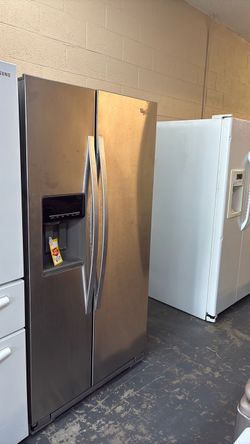 Like new Whirlpool stainless steel refrigerator