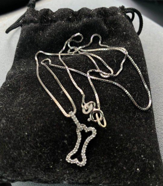 14kt Chain With 14kt Diamond Bone Pendant 