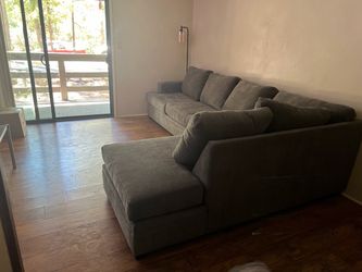 Living Spaces Sectional with Queen Sleeper