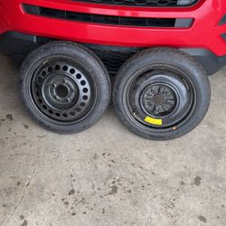 These Are Two Temporary Spare Tires One With a 5 Bolt Pattern And One With A 4 Bolt