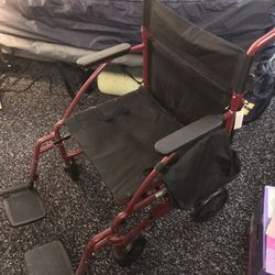 Like New Fold up Transport Wheelchair With Footrests & Wheel Locks  