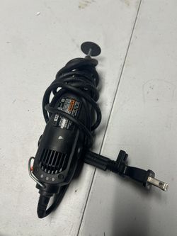 Dremel 100 Series or 200 Series corded electric rotary tool.  