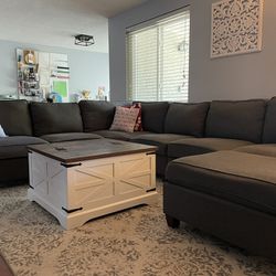 Dark Gray Sectional Couch and Ottoman 