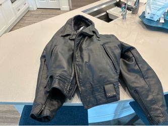 Genuine, leather motorcycle jacket  ￼