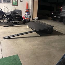 Pick up truck slide and lock cover