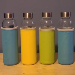 Set of 4 Glass Juicing Bottles with Sleeves
