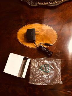 Microlife AC Adapter. Brand new. Never used. Still in original packaging. Input: 100-240V~50/60Hz 0.3A Output: 6V 0.6A
