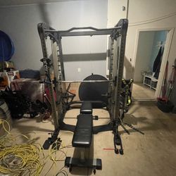 Smith Machine With Weights And Attachments