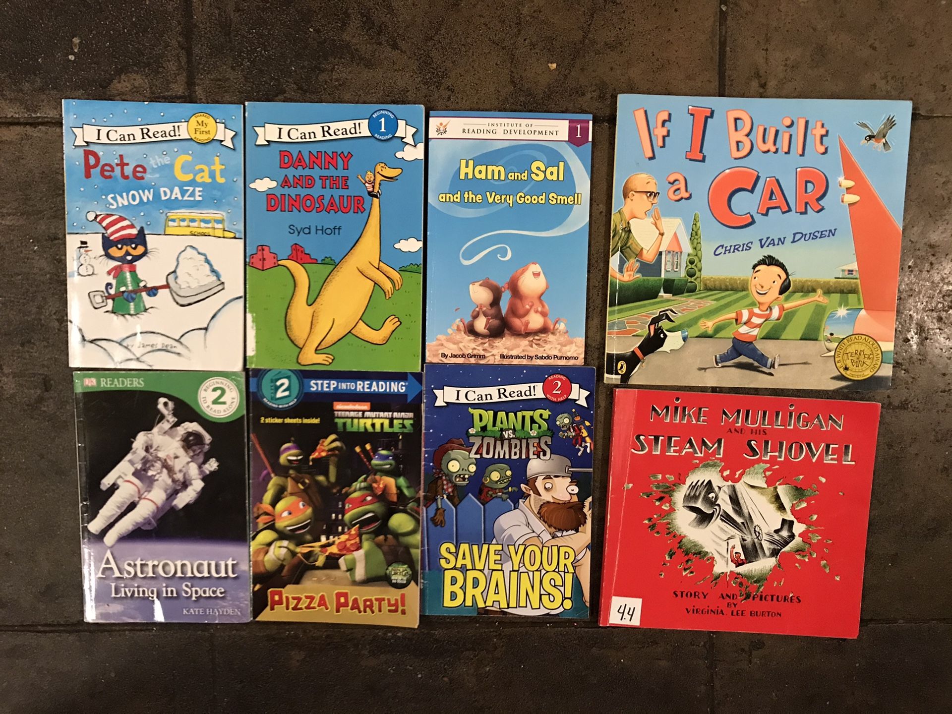 Eight softcover children books