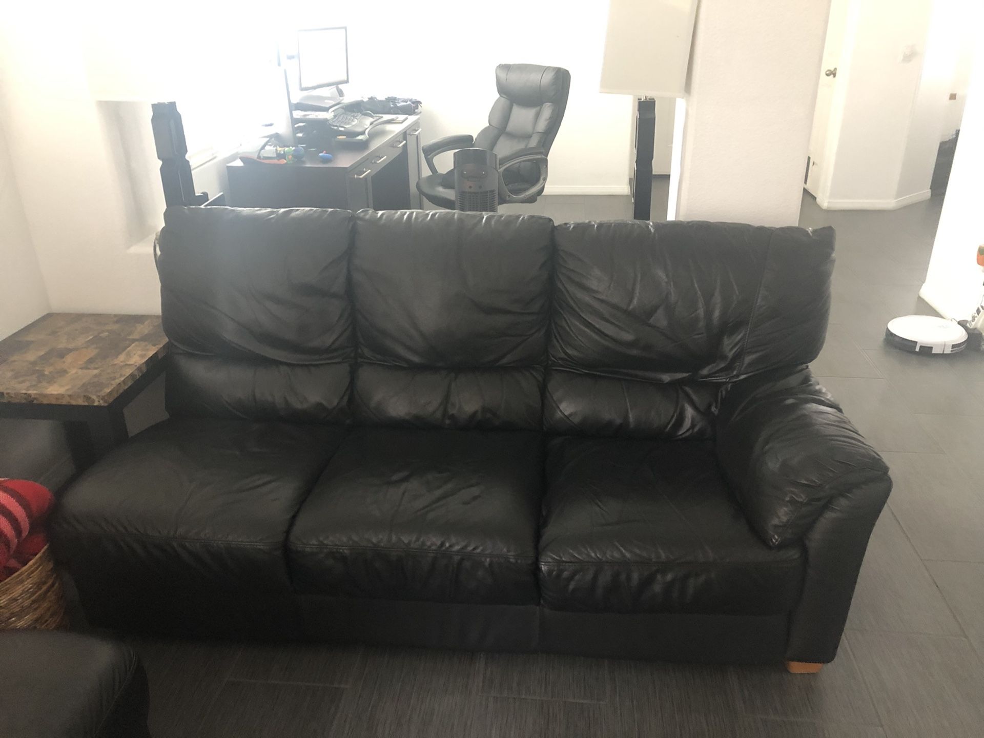 Black leather couches