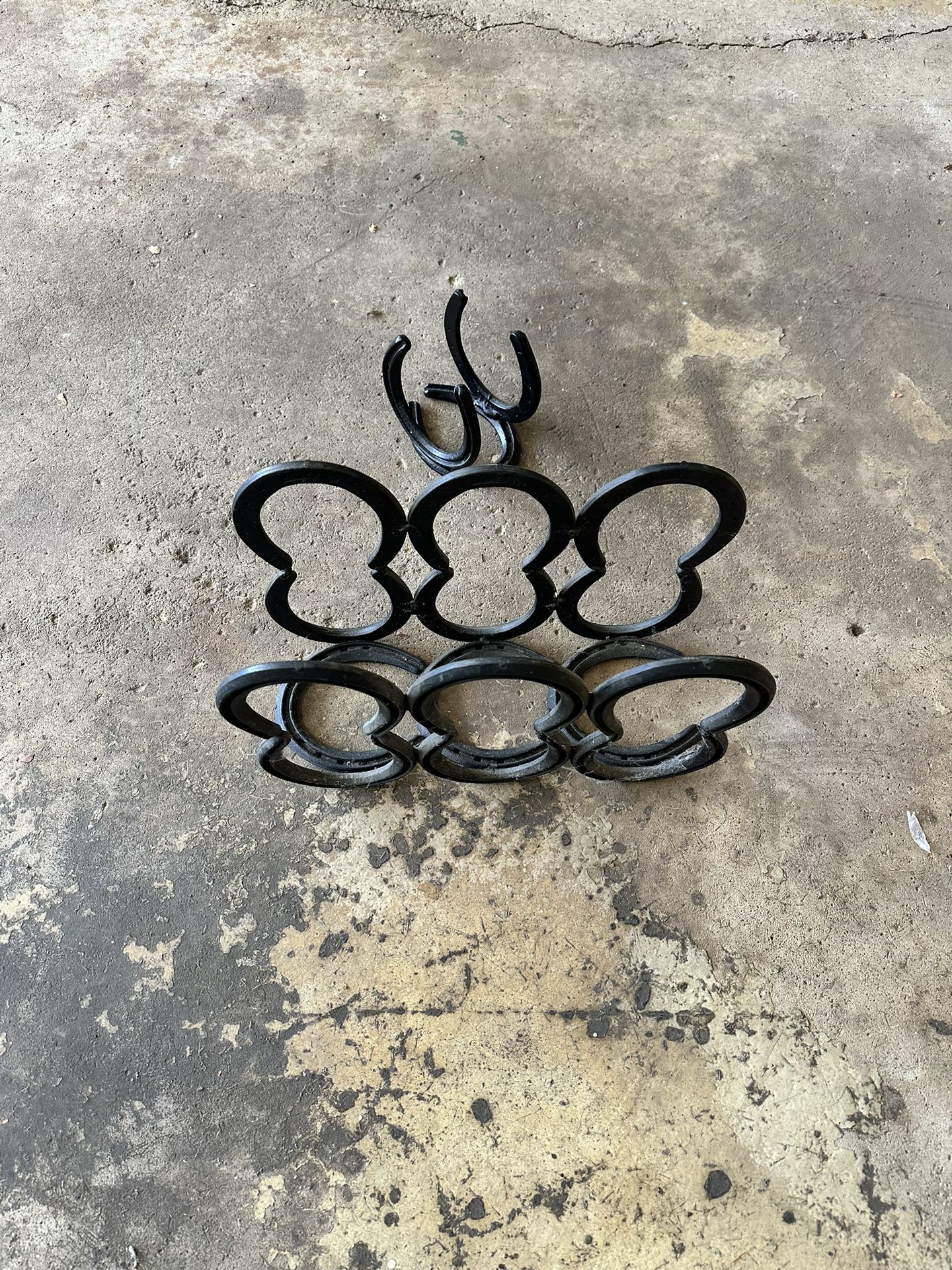 Horseshoe magazine rack, and napkin holder