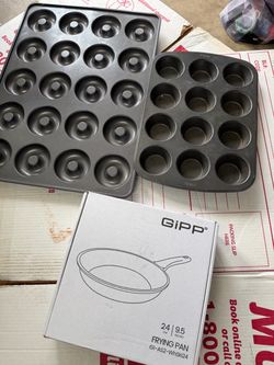 Brand new frying pan, donut pan and muffin pan