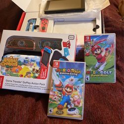 Nintendo Switch With Game Traveler Go play Action Pack And 2 Games