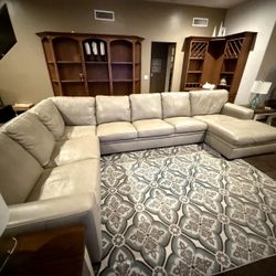 Light beige leather sectional. Great Condition 