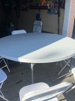 70” Round Table and 10 chairs