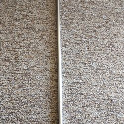 Mini self hanging curtain rod. Extends to 4 feet