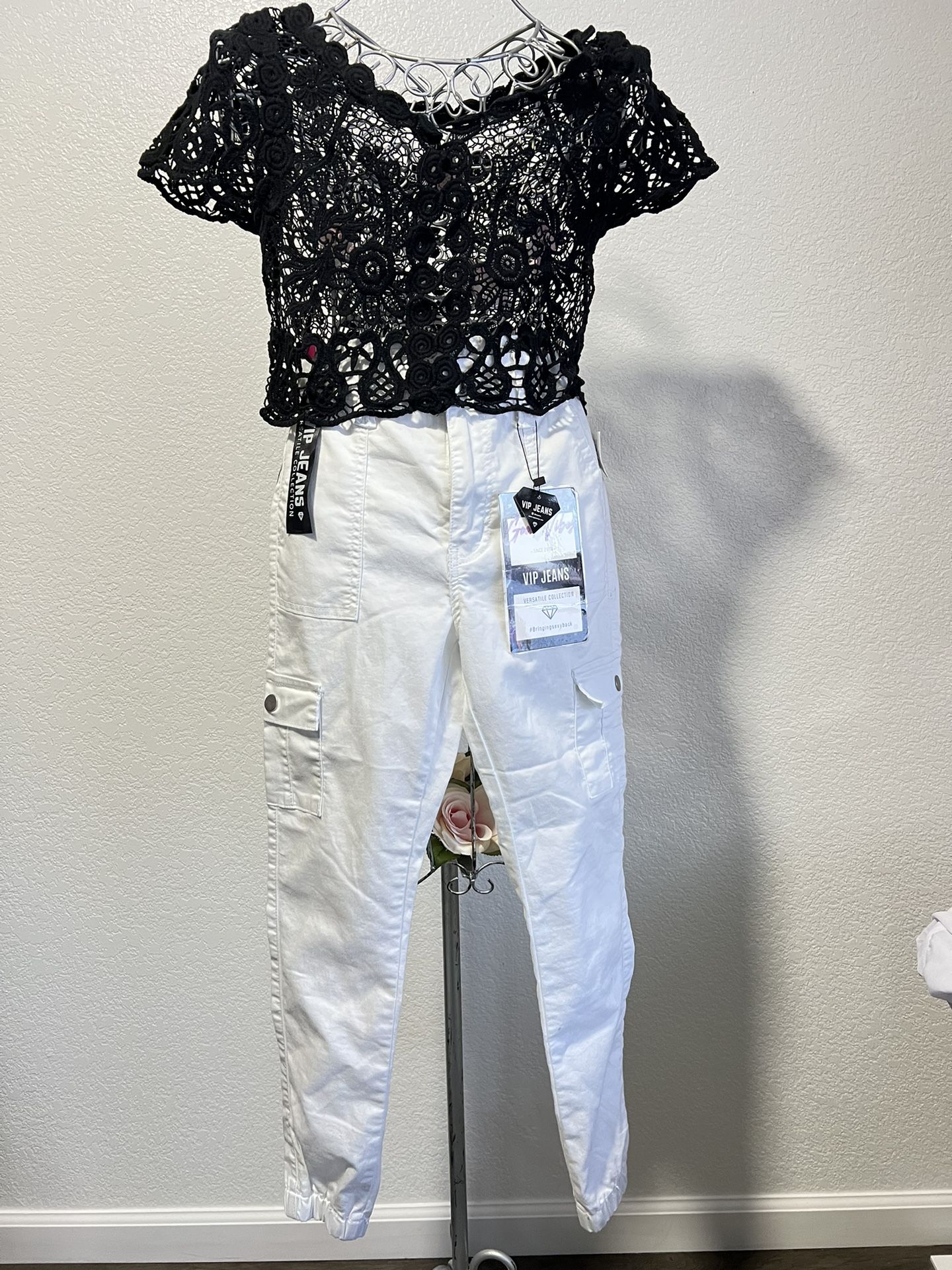 VIP jeans  Womens pants  Size 5/27 Black top size S Detail in photos  A dust stain on the back