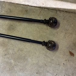 50-90 Inches Two adjustable link curtain rods missing the brackets can be purchased at Walmart