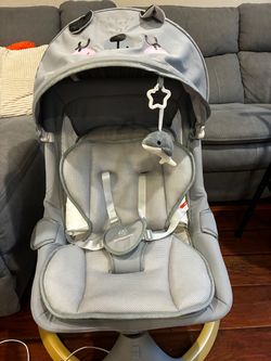 Baby swivel swing