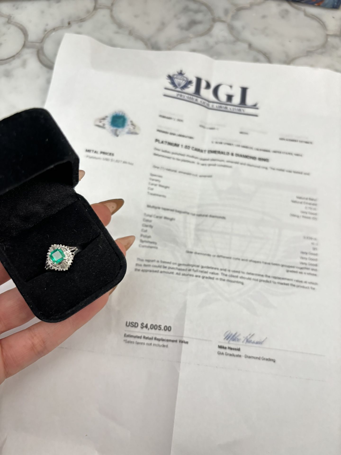 platinum 1.02 Carat natural emerald and diamond ring