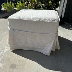 Upholstered ottoman- small