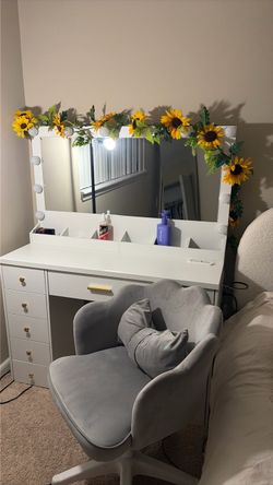 Vanity and scalloped chair