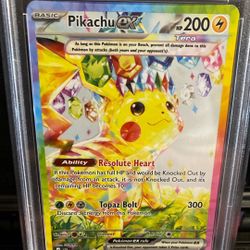 Surging Sparks Pikachu PSA9