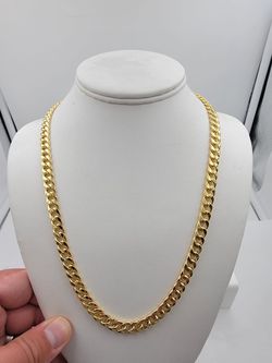 14k yellow gold cuban link chain, 22 in , 6mm wide, weight 30.4 grams.
