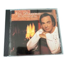 The Christmas Album - Audio CD By Neil Diamond  Get into the holiday spirit with "The Christmas Album" by Neil Diamond. This CD features a compilation