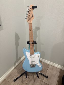 Squire Guitar with strap bag and tuner