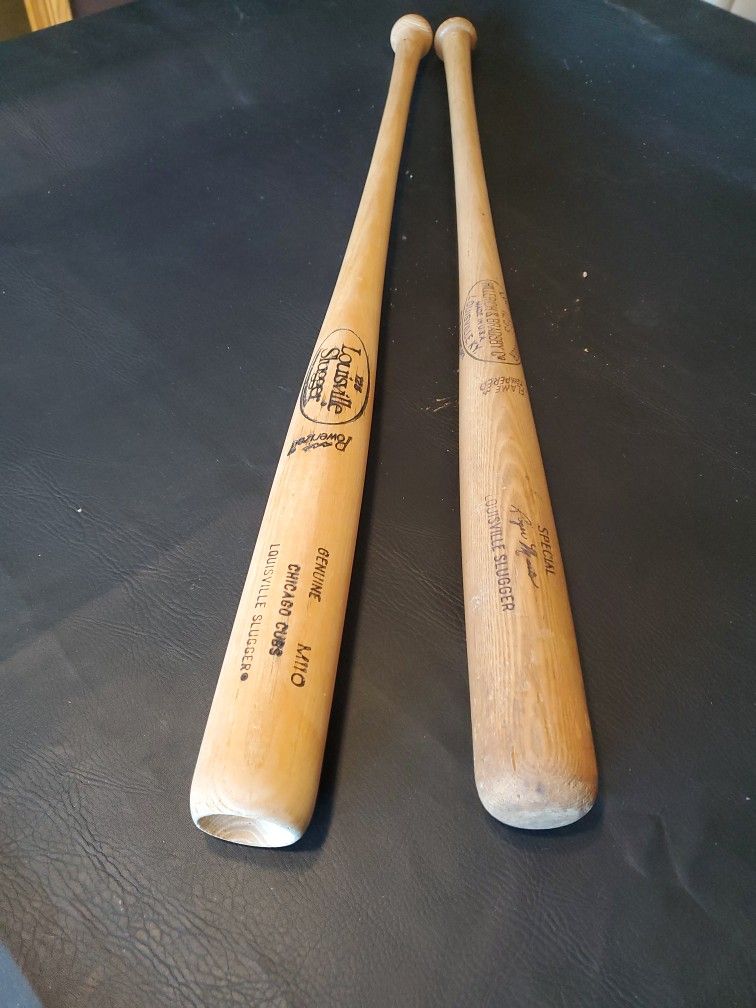 Two Louisville Slugger Baseball Bats